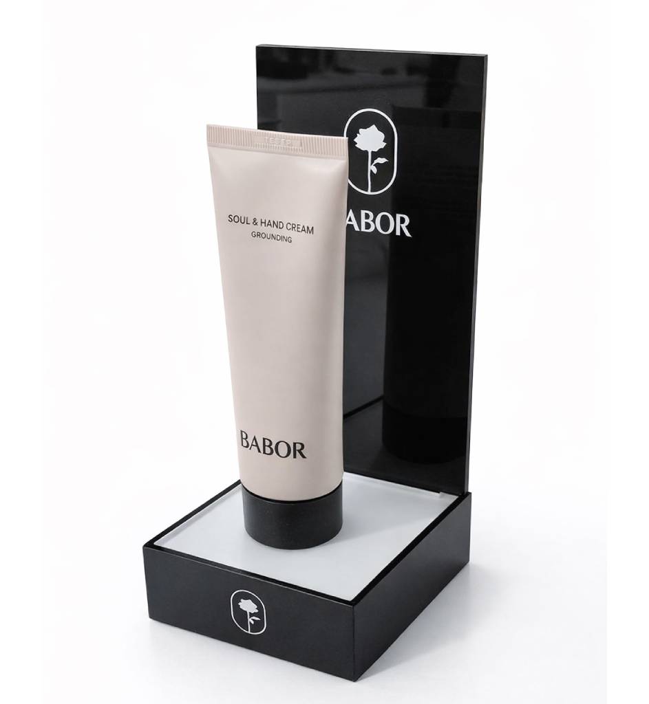 Expositor de metacrilato para cremas Babor con cabecera y base para punto de venta