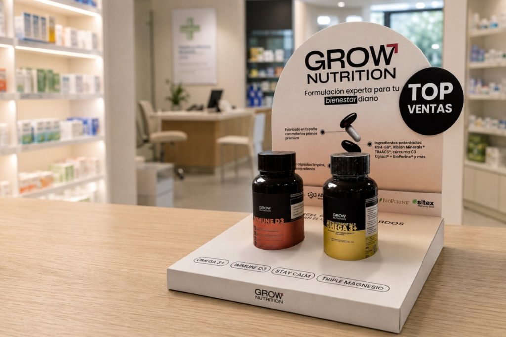 Display PLV de mostrador para suplementos GROW Nutrition en farmacia.